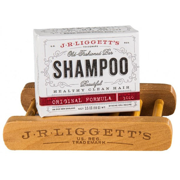 J.R Liggetts Original Formula Bar of Shampoo resting on a wooden shelf